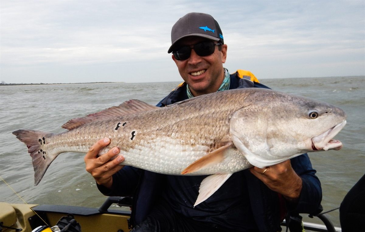 Kayak fishing for bull reds in Sea Island, Georgia